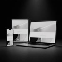 Phone, tablet and laptop showing the same website
