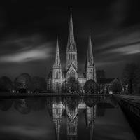 Lichfield Cathedral's three spires at dusk